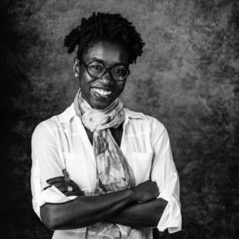Black and white photo of Dr. Joy Buolamwini