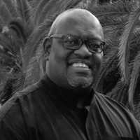 Black and white photo of John Githongo